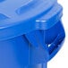 A blue Rubbermaid BRUTE 20 gallon plastic trash can with a lid.