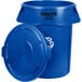A blue plastic Rubbermaid BRUTE recycling can with a lid.