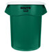A green Rubbermaid BRUTE trash can with a white lid.
