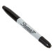 A Sharpie black and white twin-tip marker with the word "Sharpie" on it.