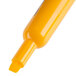 A close-up of a yellow Sharpie highlighter with a white tip.