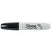 A close up of a black Sharpie Chisel Tip Permanent Marker.