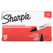 A box of 12 Sharpie black chisel tip permanent markers.