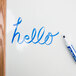 A white board with the word "hello" written on it in blue Expo dry erase marker.