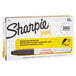 A white package with black text that reads "Sharpie Pro Black Fine Point Industrial Permanent Marker 12/Pack" and a black Sharpie marker.