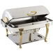 A Bon Chef stainless steel rectangle chafer with brass accents on a catering table.