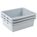 A stack of three gray Rubbermaid bus tubs.
