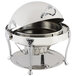 A Bon Chef stainless steel chafing dish with chrome accents on a stand with a lid.