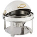 A white and silver Bon Chef round chafer with brass accents and a lid.