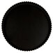 A black round pan with a fluted surface.