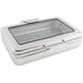 A silver rectangular Bon Chef chafer with a glass lid.