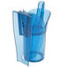 A close-up of a blue plastic container with a handle holding a blue San Jamar ice scoop.