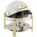 A silver and gold Bon Chef chafing dish with a lid.