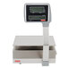 A Tor Rey W-LABEL40L digital scale with a screen.