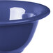 A close-up of a Carlisle Ocean Blue rimmed melamine bowl.