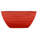 A fire engine red Vollrath square serving bowl.
