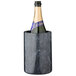 A bottle of champagne in a Franmara black marble wine cooler.