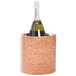 A bottle of champagne in a customizable cork wine cooler.