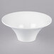 A white fluted melamine pedestal bowl.