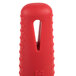 A red silicone handle holder with a hole for a skillet handle.