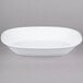 An American Metalcraft white oval melamine serving bowl.