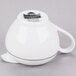 A white porcelain creamer with silver double line trim.
