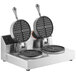 A Nemco SilverStone dual waffle maker with two waffles.
