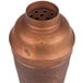 An American Metalcraft antique copper cobbler cocktail shaker with a hammered finish.