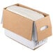 A LouAna cardboard box with a white plastic bag inside.
