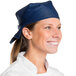 A woman wearing a navy blue chef neckerchief.