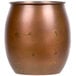 An American Metalcraft antique copper Moscow Mule tumbler on a brown surface.