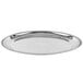 A Vollrath stainless steel round serving tray with a round rim.
