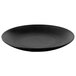 A black matte round melamine plate with a circular rim.