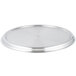 A silver round Vollrath stainless steel pan cover with a loop handle.