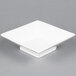 A case of 24 white square porcelain bowls with a square base.