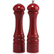 Two red Chef Specialties pepper mills with silver tops.