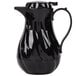 A black plastic Choice coffee carafe with a handle.