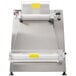 A Doyon countertop dough sheeter with a clear cover over the machine.