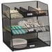 A black wire mesh Safco breakroom organizer with utensils and forks.