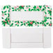 A white rectangular box with a green and red holly pattern.