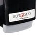 A black Kutol Soft & Silky hand soap dispenser with a white label on a counter.
