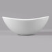 A white oval melamine bowl with a textured rim.