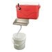 A white bucket in a red and white Micro Matic Jockey Box cooler.