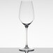 A clear Spiegelau white wine glass on a white background.