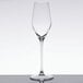 A clear Spiegelau Superiore flute wine glass on a white table.