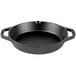 A Lodge black cast iron skillet with two handles.