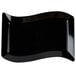 A black rectangular plastic plate with a curved edge.