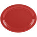 A cranberry oval platter with a white border.