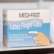 A box of Medi-First latex finger cots.