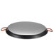 A Matfer Bourgeat carbon steel paella pan with red handles.